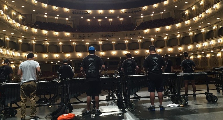 students on stage playing instruments during Bass Hall High School Percussion Camp