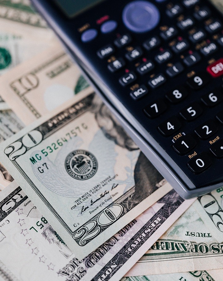 calculator on top of money