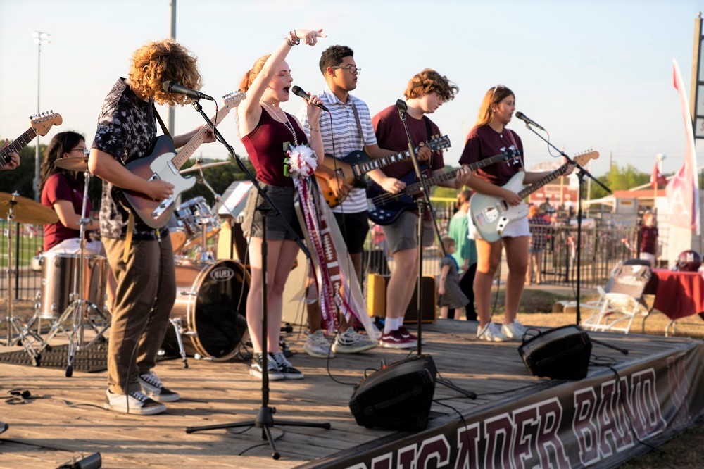 St. Michael's CruBand performing at tailgate