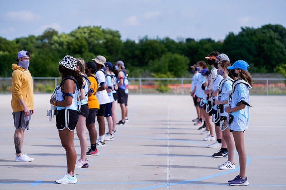 Wakeland High School drumline wearing masks 