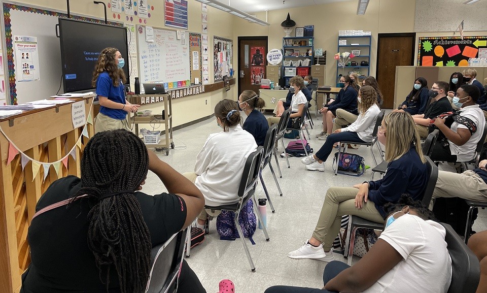 Crosby Middle School choir student speaking in front of class 