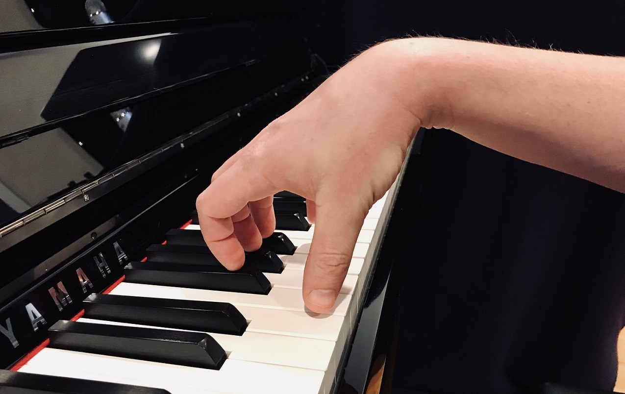 wrist too high when playing 