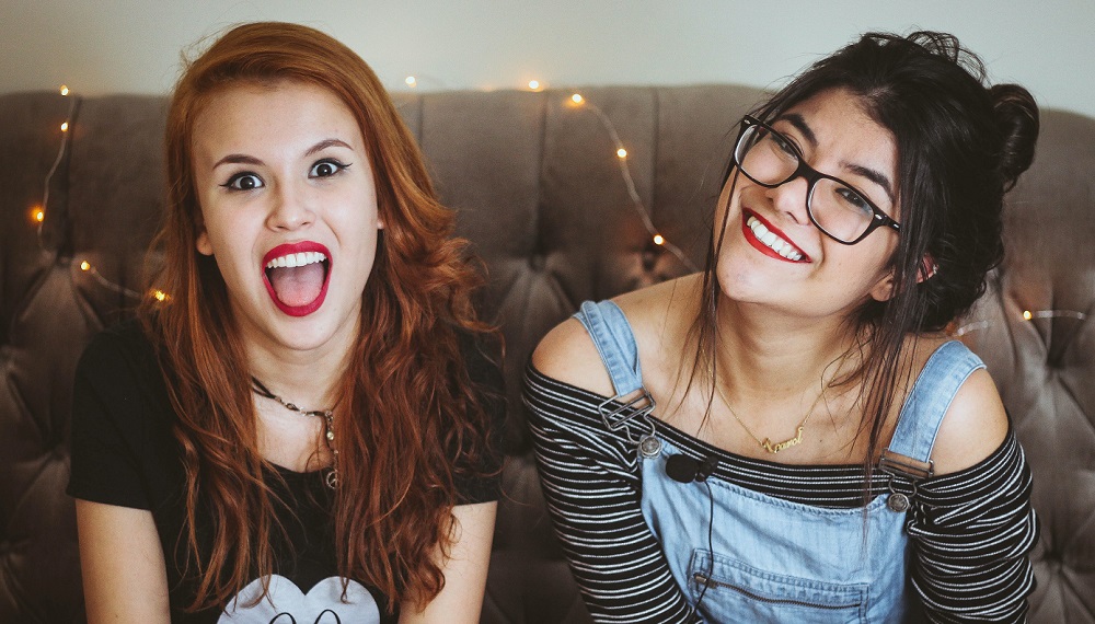 two happy female students LIaLQ2SIQuk unsplash