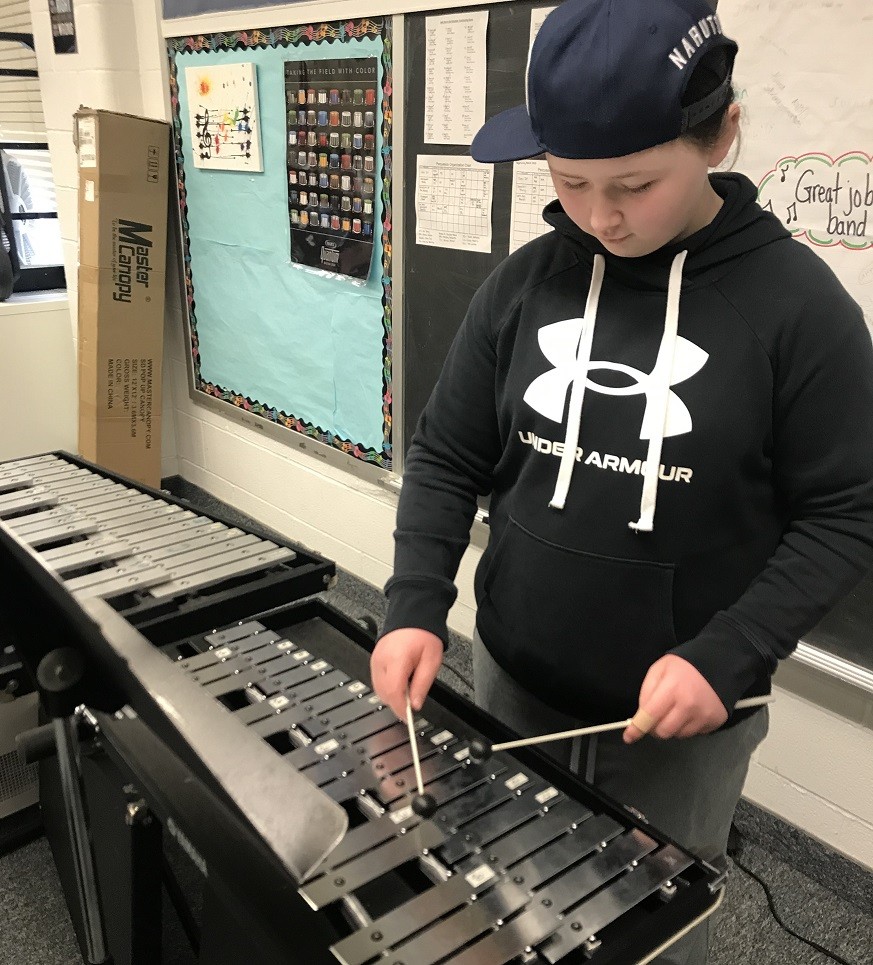 Charlee Bentley playing mallet percussion instrument 