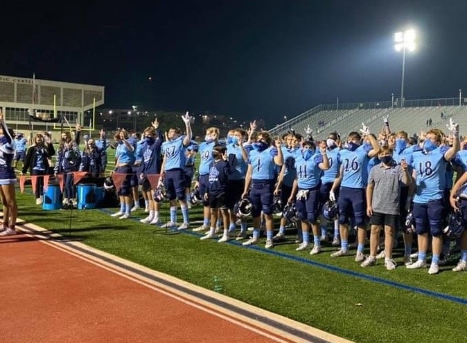 football team on sidelines