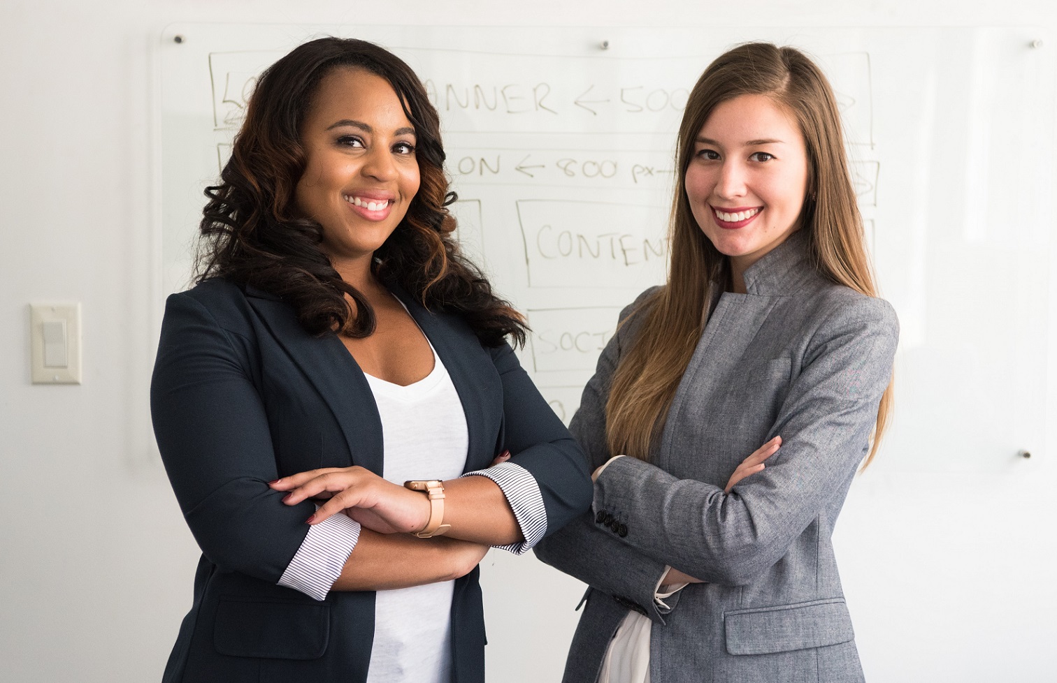 2 confident women leaders unsplash