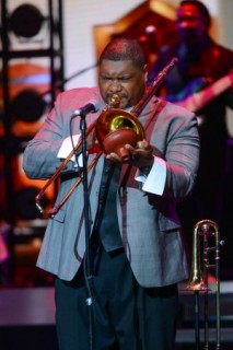 Wycliffe Gordon plays trombone on stage