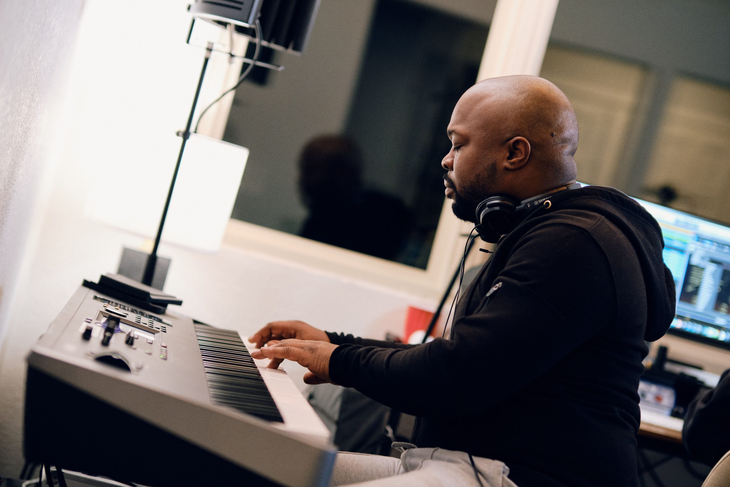 A man playing a keyboard.
