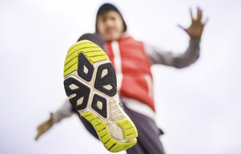 Man kicking.