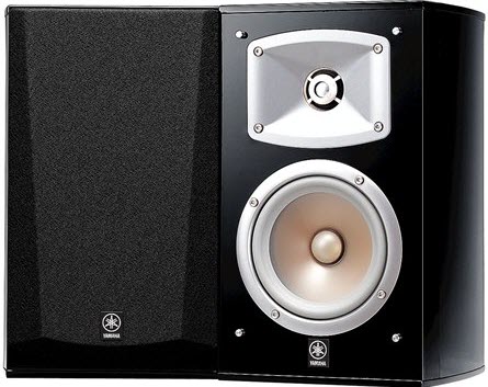Pair of small audio speakers one with the filter cover removed to show the speaker and subwoofer.
