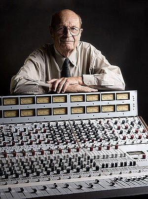 Fig 7 Older gentleman standing behind and leaning on a sound board.