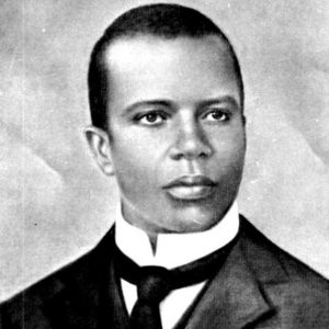 scott joplin Drawing of a young African American man with a tight cropped haircut in a suit with a standup collar and tie.