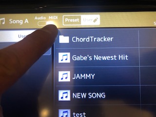 Genos and Chord Tracker Body Image 14 An image of a Genos digital display with multiple menu buttons visible.