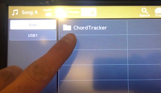 Genos and Chord Tracker Body Image 15 An image of a Genos digital display with the Chord Tracker folder highlighted.