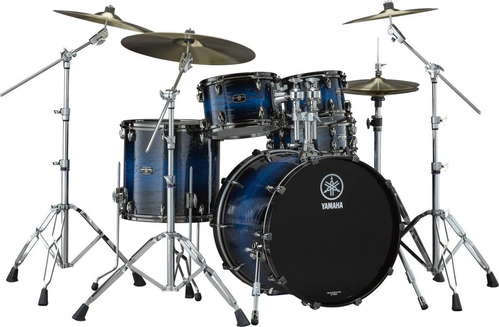 live custom hybrid oak drums body image 1400 Full drum kit with four cymbals, a tenor, two snares and a bass drum.