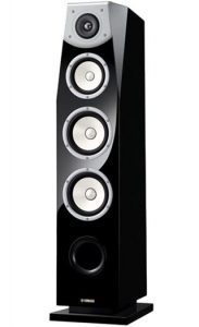Tall freestanding floor speaker.