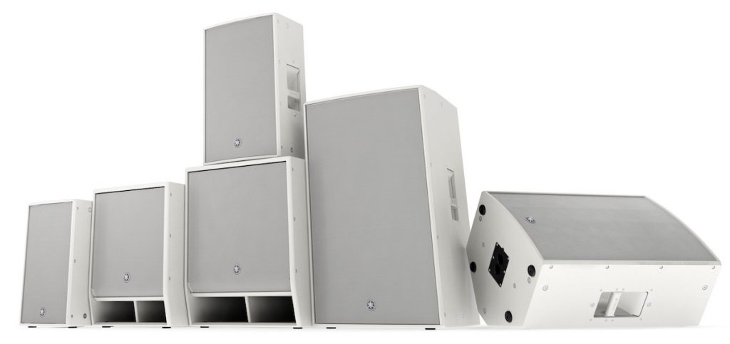 Set of six white rectangular speakers.