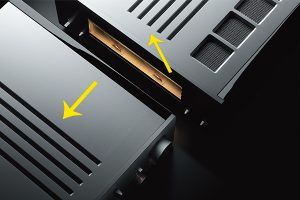 Square black amplifier and preamplifier with five vents on top of each.