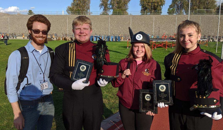 Cle Elum Roslyn band members hold trophies