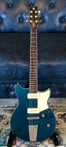 Yamaha Revstar 502TFM guitar with subtle flame maple top and finished with a hand-rubbed Vintage Japanese Denim.