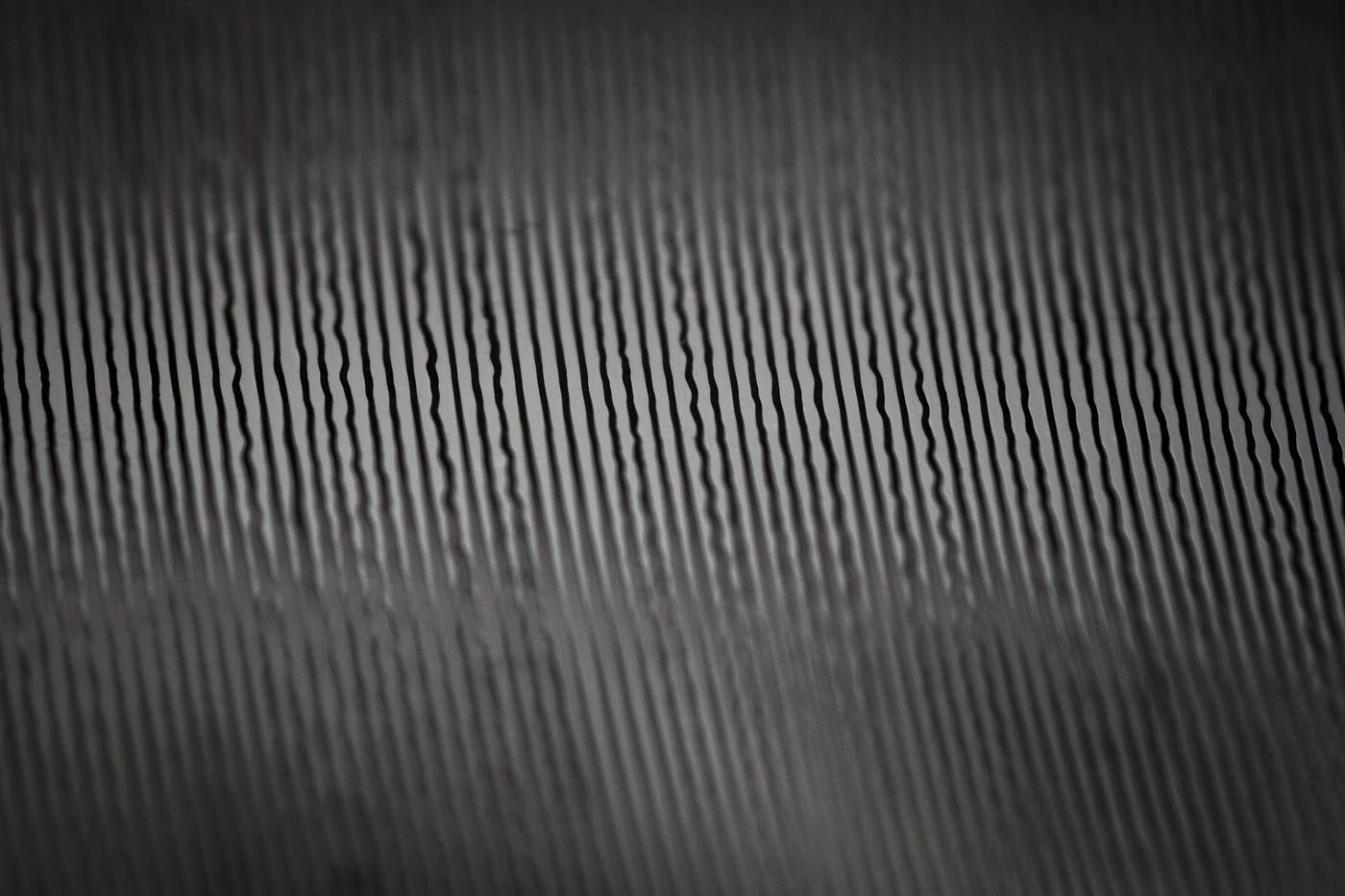 Record-grooves-1400 Closeup of the grooves on the aluminum disc.