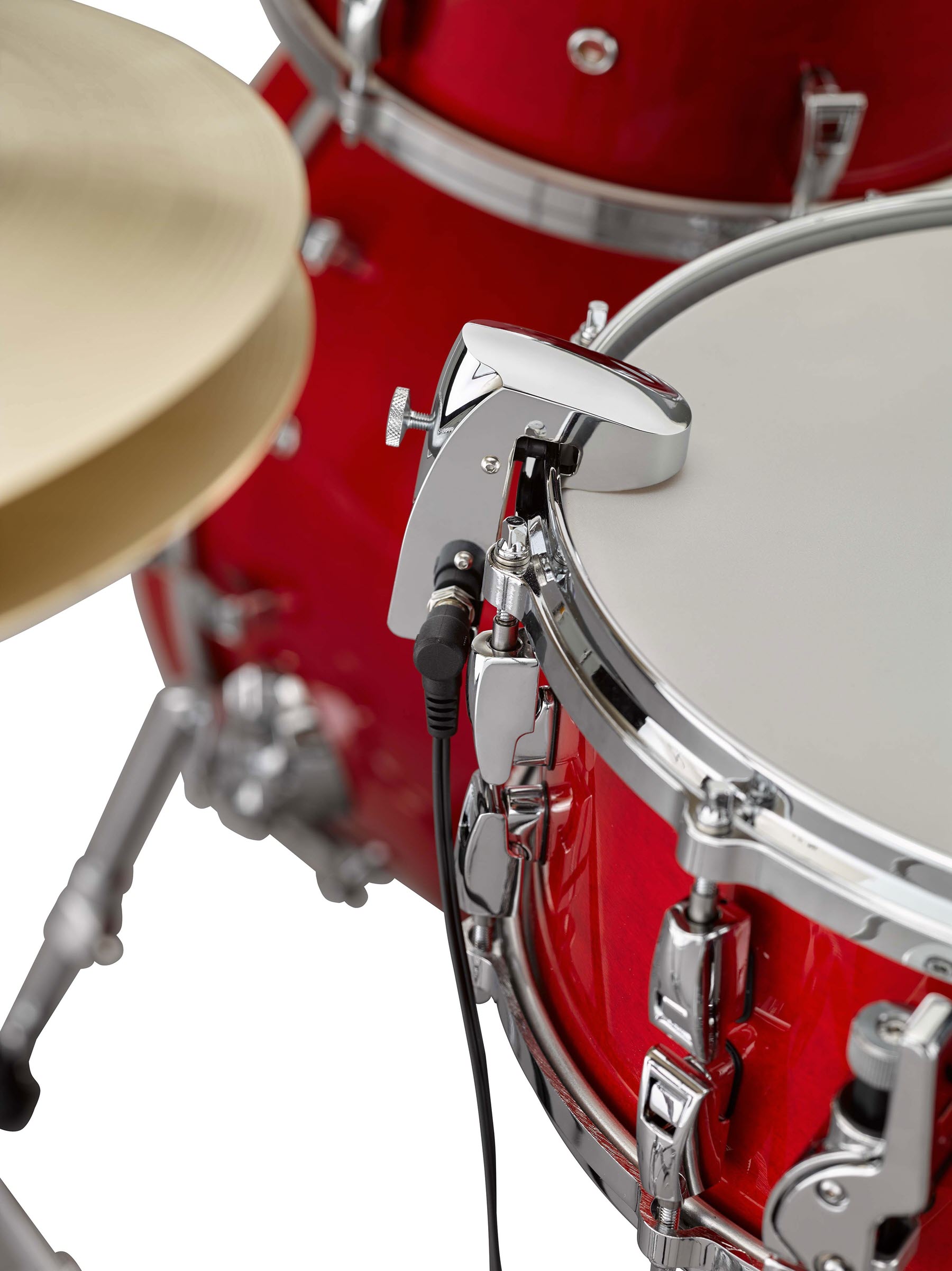 LiveDrumming_Fig5-resize Closeup of a snare drum with sensor attached.