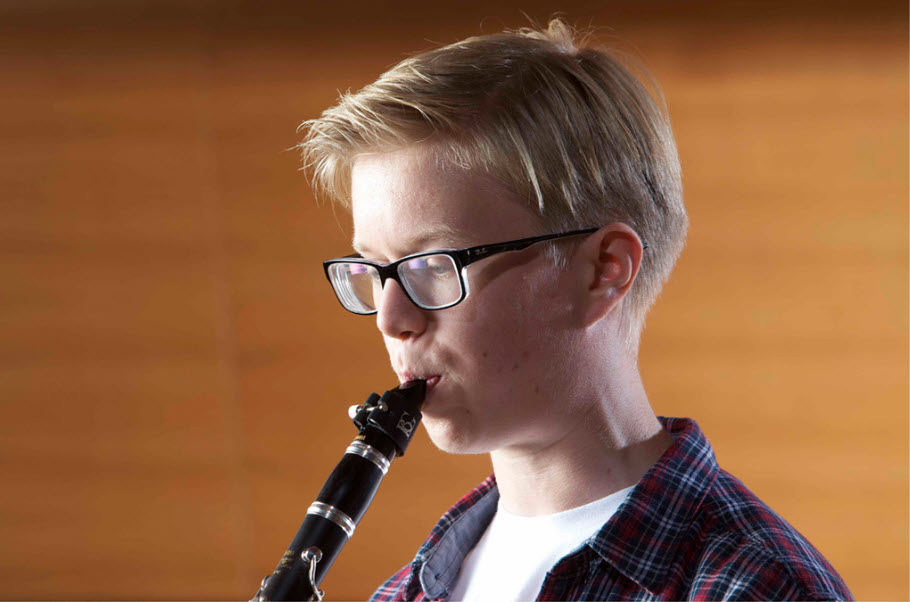 clarinet Young boy playing a clarinet.