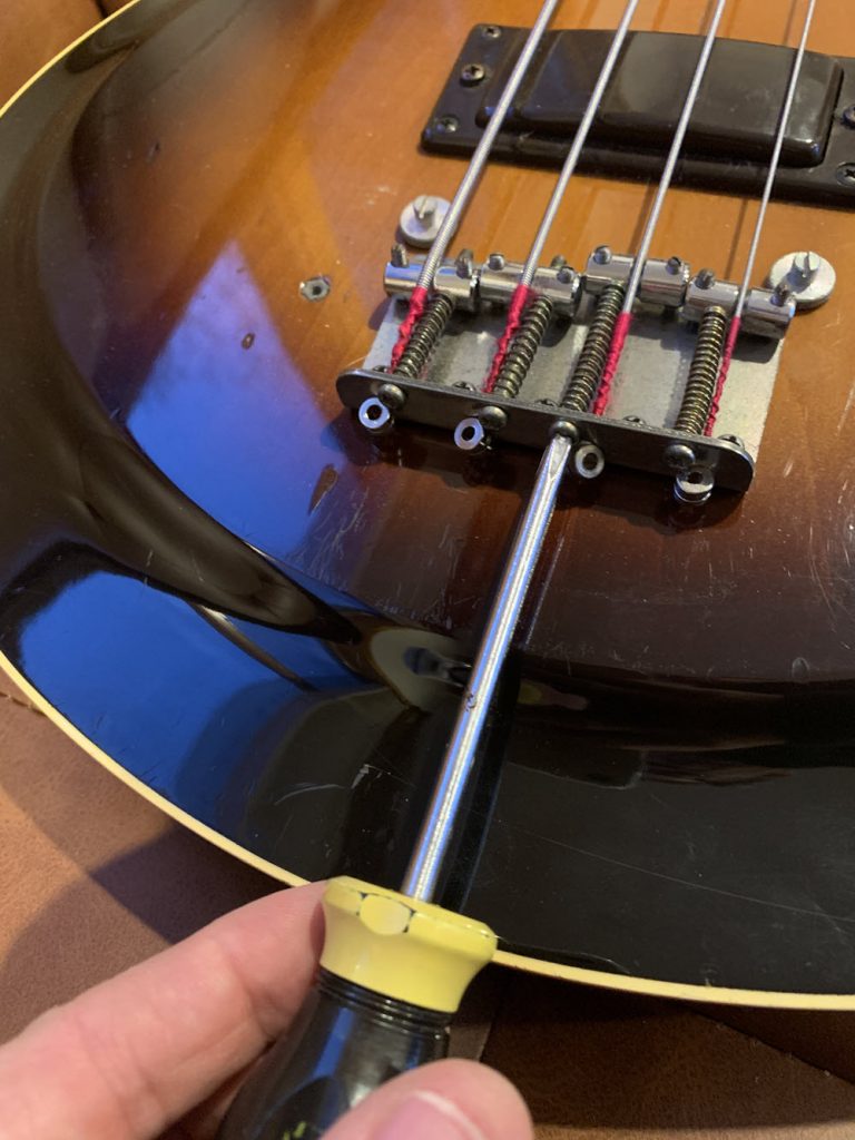 Yamaha-adjust-saddle-screw-1k Closeup.