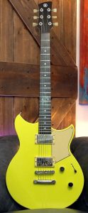 Yellow electric guitar.