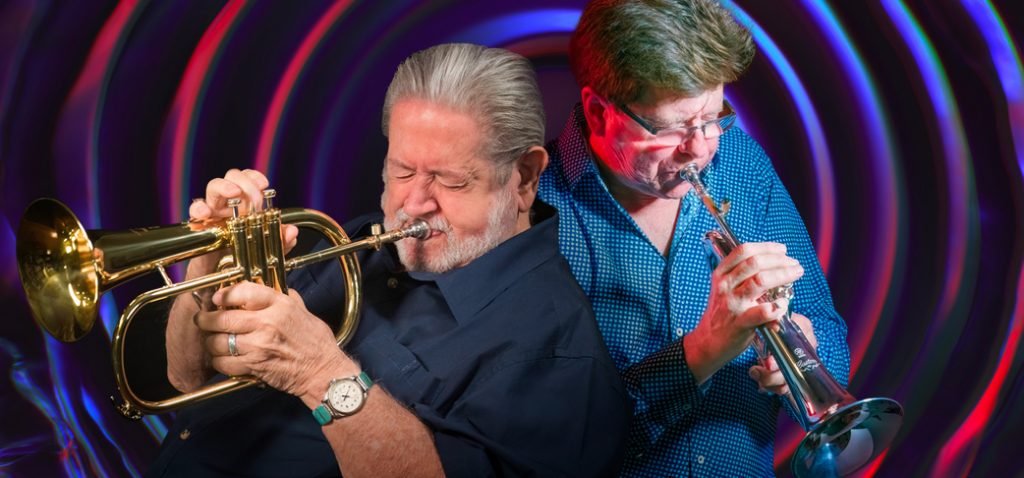 Graphic with image overlays of Bobby Shew and Wayne Bergeron playing Yamaha flugelhorns.