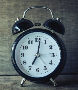 alarm clock showing 7 a.m.