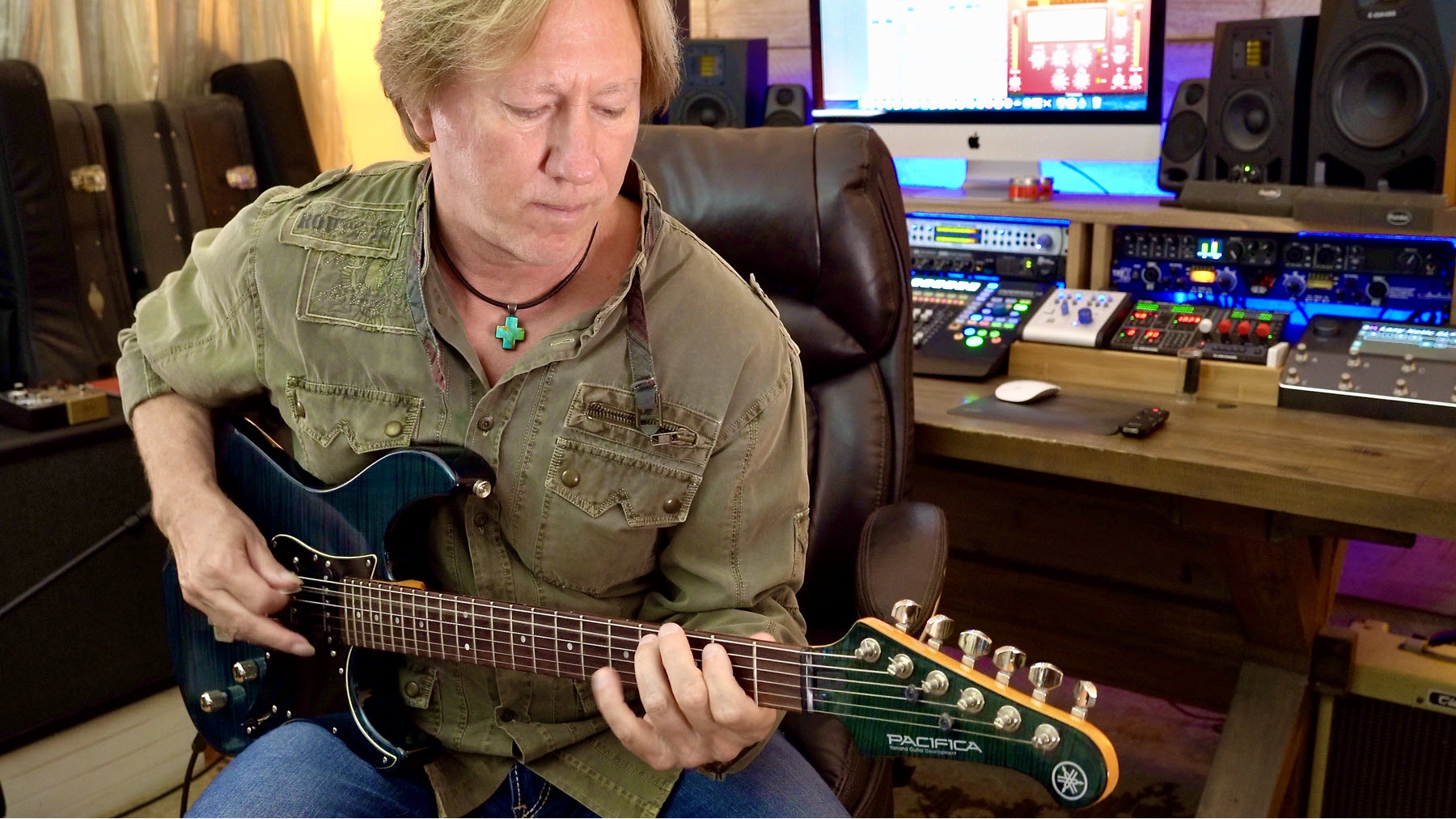calvo-pacifica-resize Playing guitar in his studio.