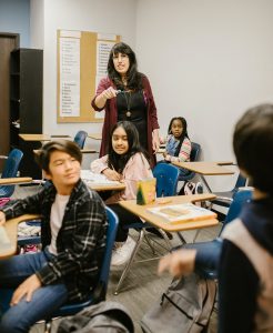 teacher in class with students