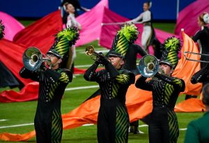 The Reagan band in a climactic moment of its “In Plain Sight” production at the 2023 Bands of America San Antonio Super Regional.