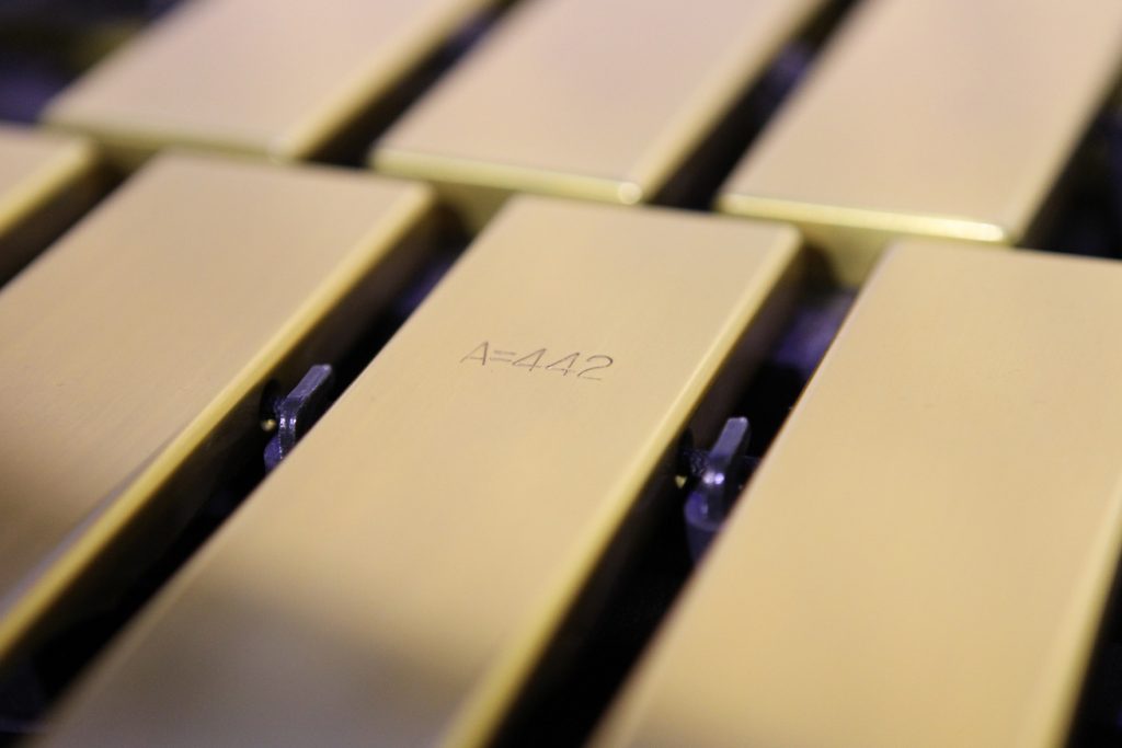 close up of gold bars on vibraphone