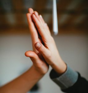 teacher and student high-five