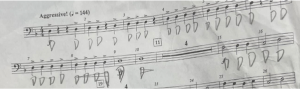 music sheet with letter of notes written by student