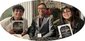 Educator Trevor Tran with two of his students 