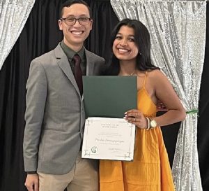 Educator Trevor Tran with a student