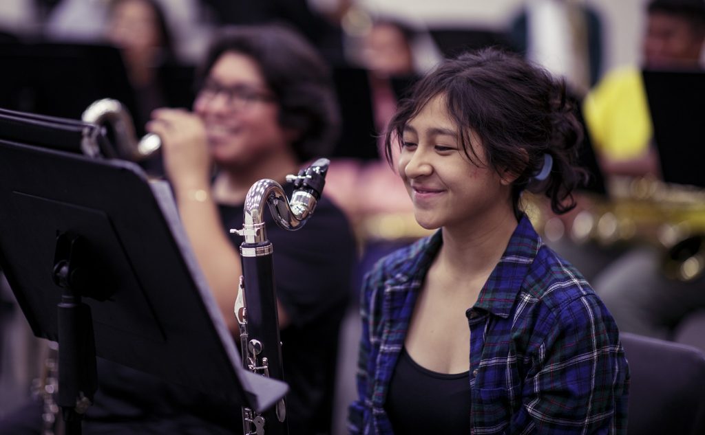 happy band students during rehearsal