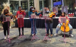 five female students perform at the Nutcracker pre-show