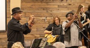 jazz pros performing trumpet with jazz band