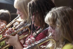 winds section during rehearsal