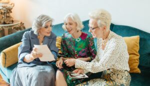 three women talking and laughing