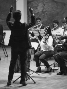 conductor in front of band