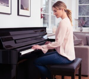 A woman plyaing piano.