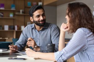 a male and a female teacher collaborating