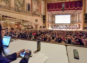 an Eastman student watches a performance at Rochester Philharmonic. performance 