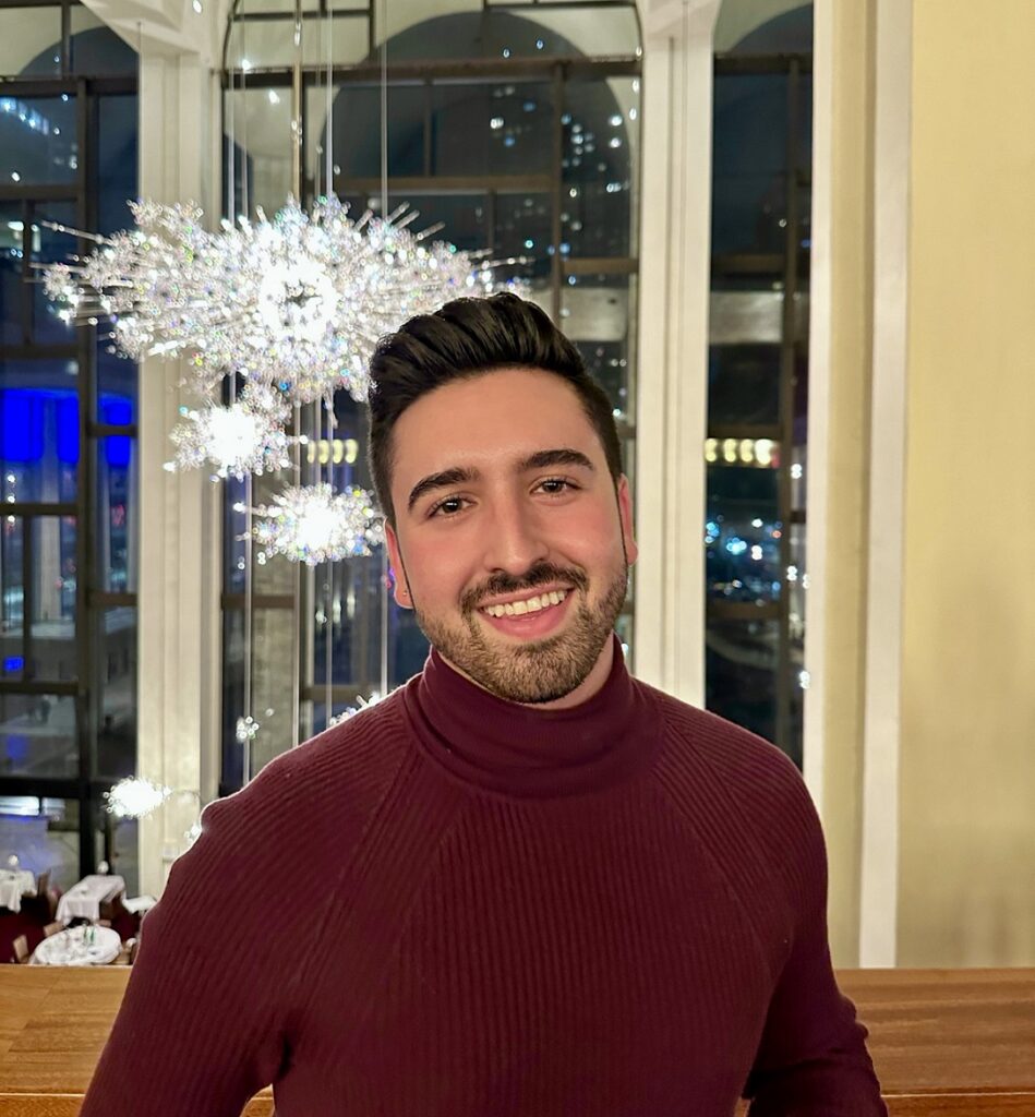 student standing in Metropolitan Opera