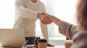 handshake between two people